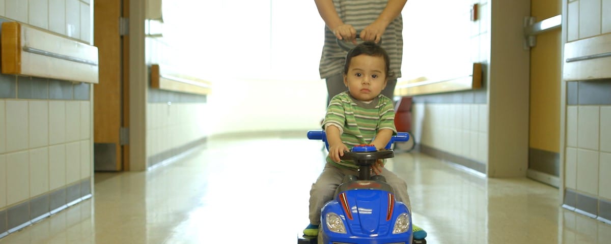 Baby on buggy being pushed