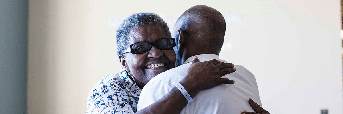 Two people hugging