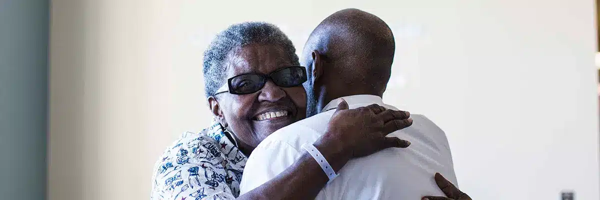 cancer patient with visitor in Georgia cancer center for cancer treatment