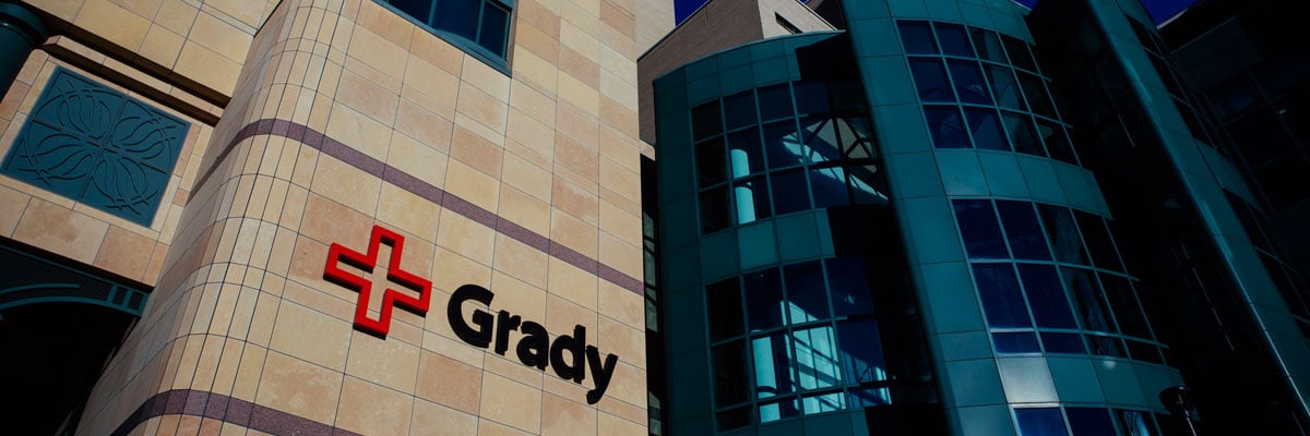 Photo of the Grady Logo on the main entrance of the main building